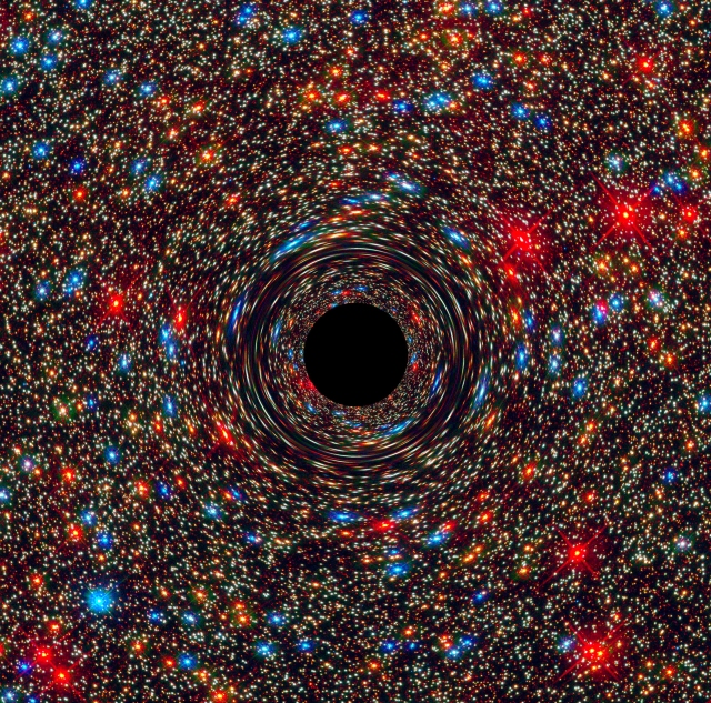 behemoth_black_hole_found_in_an_unlikely_place_26209716511